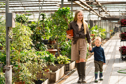 Woman and son in a garden centre